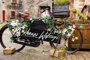 Karen Wilson branding bike outside gallery in Skerries Mills