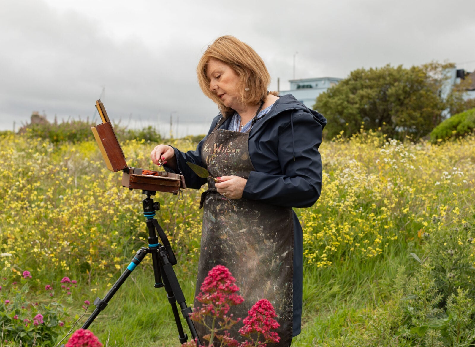 Karen Wilson painting plein air on skerries south beach